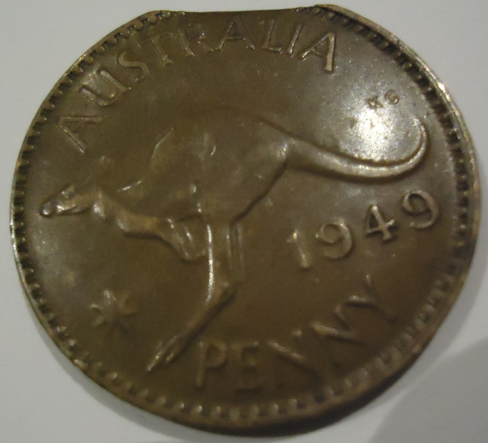 1949-Australian-Penny-Clipped-Planchet-Or-Something-Like-That---Genuine?